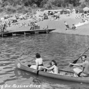 Canoe's and Beachgoers on the Russian River at Johnson's Beach in Guerneville