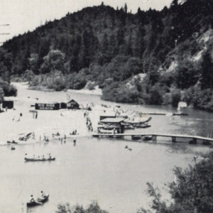 Aerial View of the Russian River at Rio Nido Beach with Canoes and Beachgoers in the Background