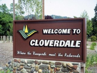 Cloverdale Where the vinyards meet the redwoods sign