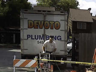 Devoto Plumbing Truck and Plumber